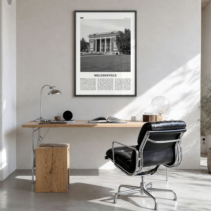 Milledgeville Newspaper Poster in a black wood frame, hanging in a bright home office
