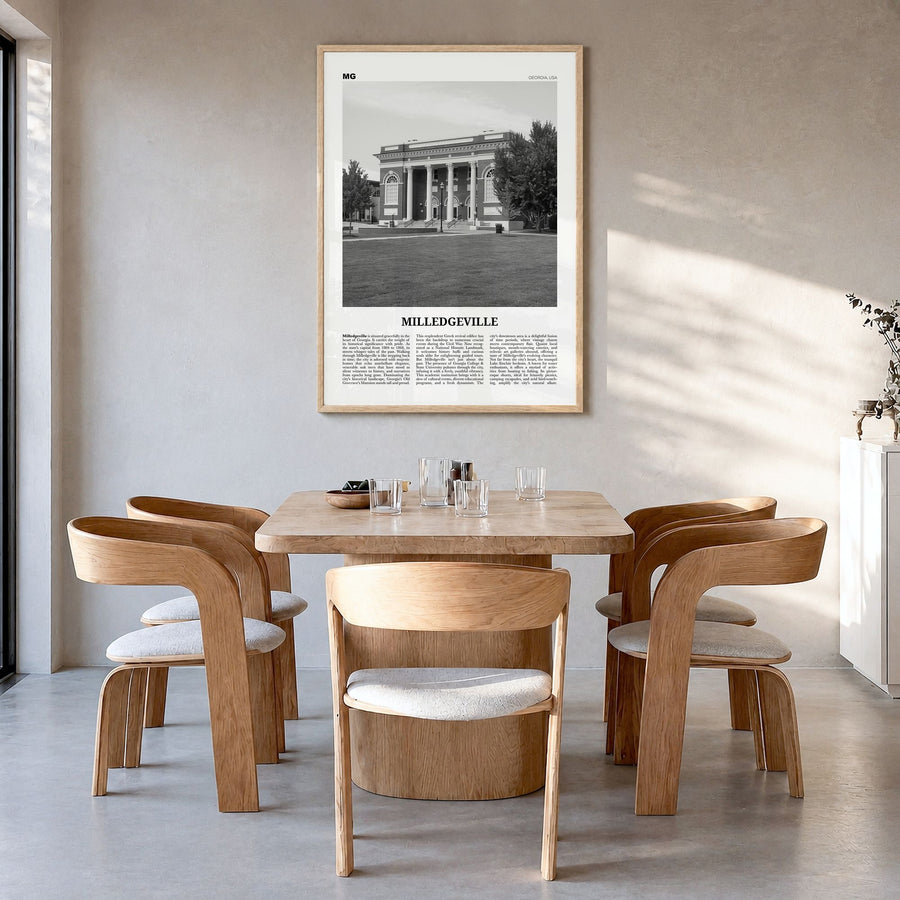 Milledgeville Newspaper Poster in a natural wood frame, hanging in a dining room