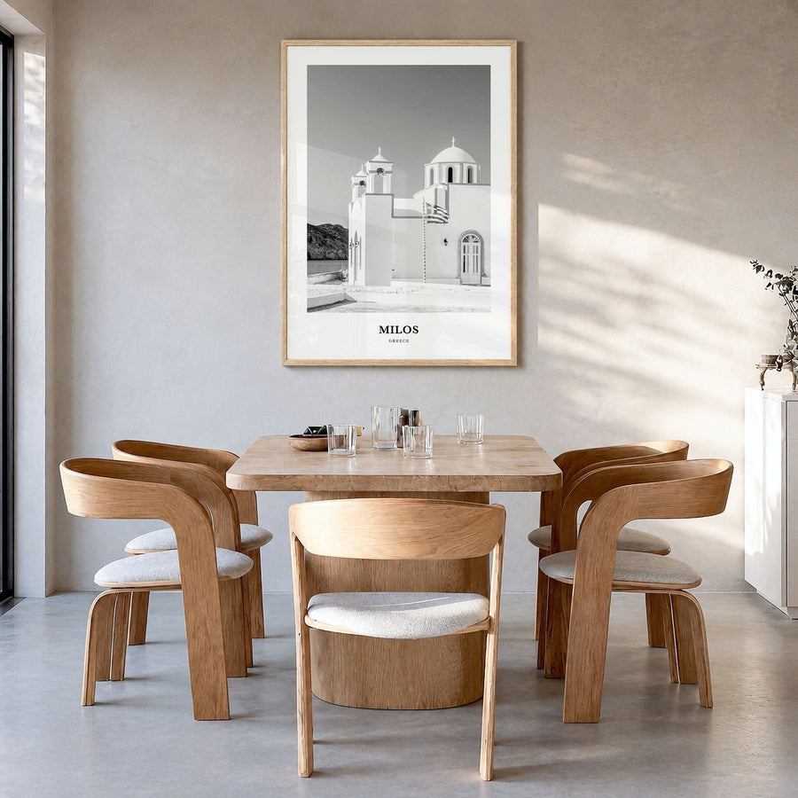Milos Classic Poster in a natural wood frame, hanging in a dining room