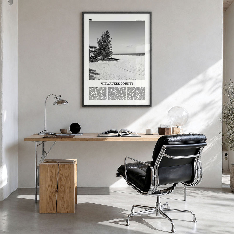 Milwaukee County Newspaper Poster in a black wood frame, hanging in a bright home office
