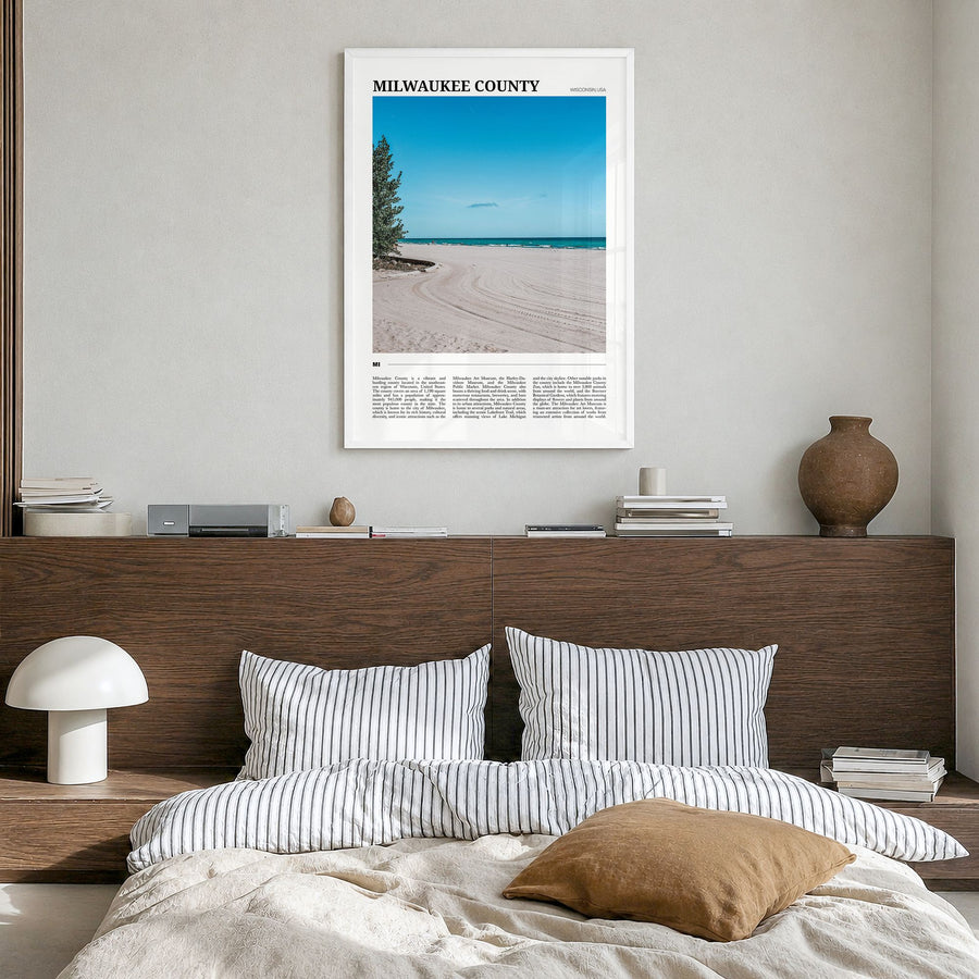 Milwaukee County Travel Poster in a white wood frame, hanging in a bedroom