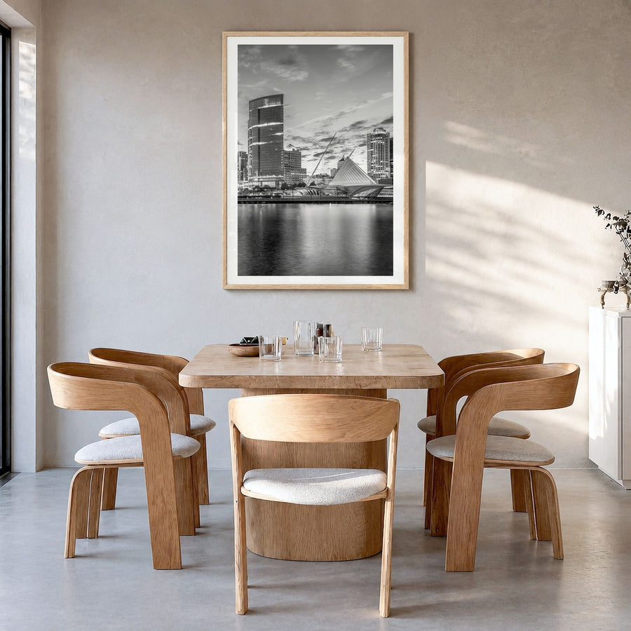 Milwaukee Photo No 1 Poster in a natural wood frame, hanging in a dining room, white border