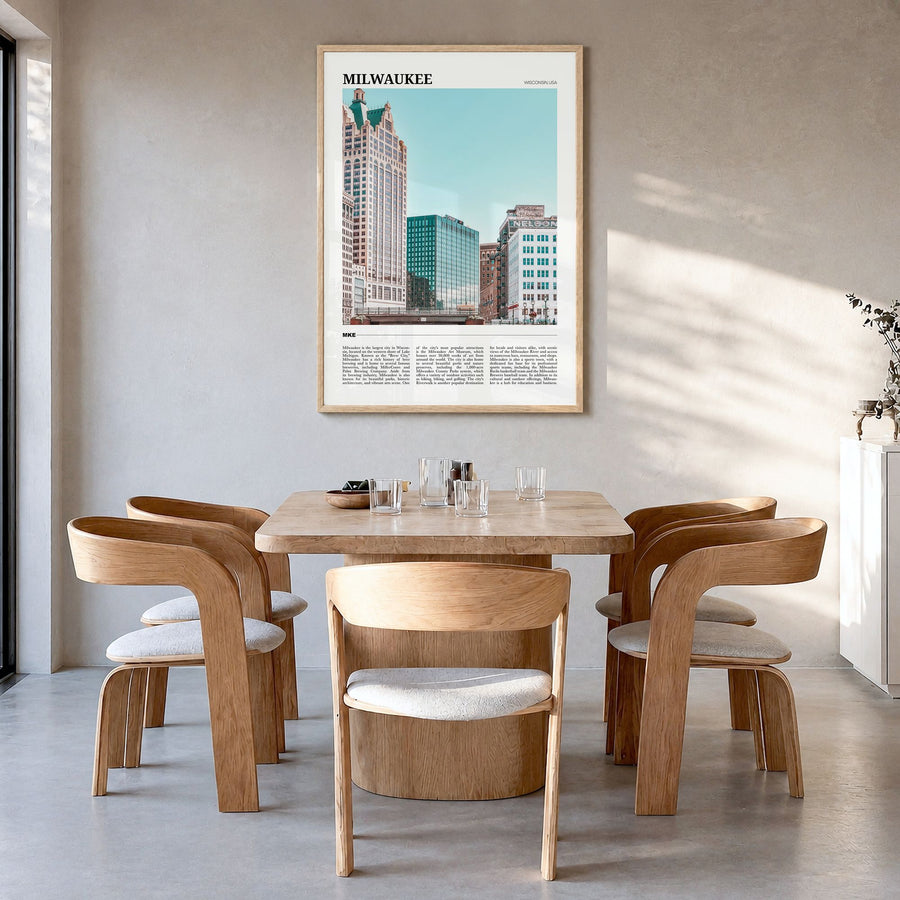 Milwaukee Travel Poster in a natural wood frame, hanging in a dining room