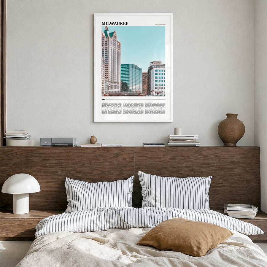 Milwaukee Travel Poster in a white wood frame, hanging in a bedroom