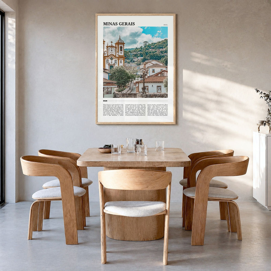 Minas Gerais Travel Poster in a natural wood frame, hanging in a dining room