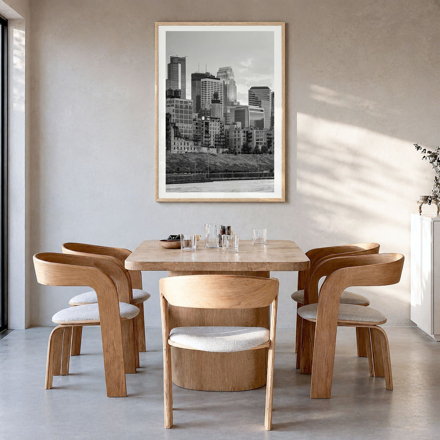 Minneapolis Photo No 1 Poster in a natural wood frame, hanging in a dining room, white border