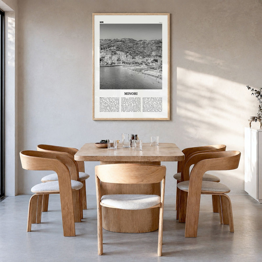 Minori Newspaper Poster in a natural wood frame, hanging in a dining room