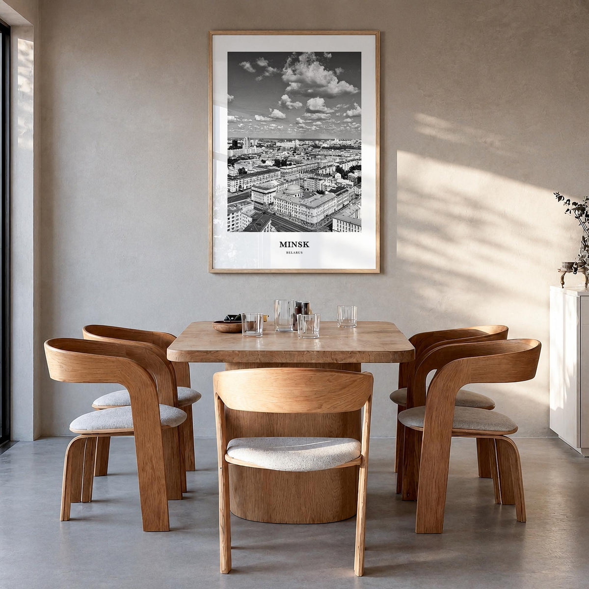 Minsk black & white classic poster of Belarus – vertical wall art in natural wood frame, hanging on wall