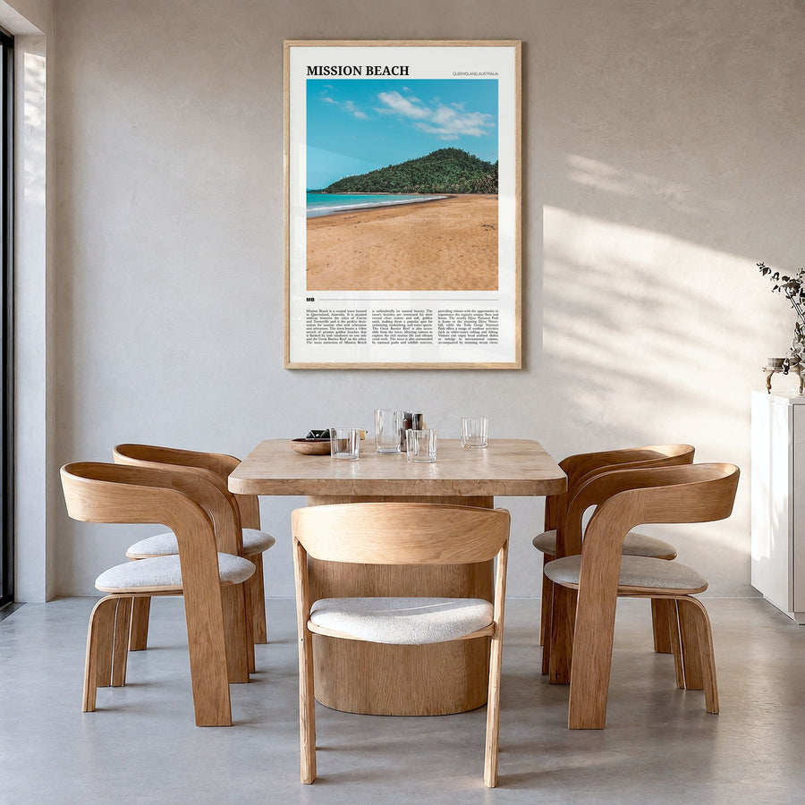 Mission Beach, Queensland Travel Poster in a natural wood frame, hanging in a dining room