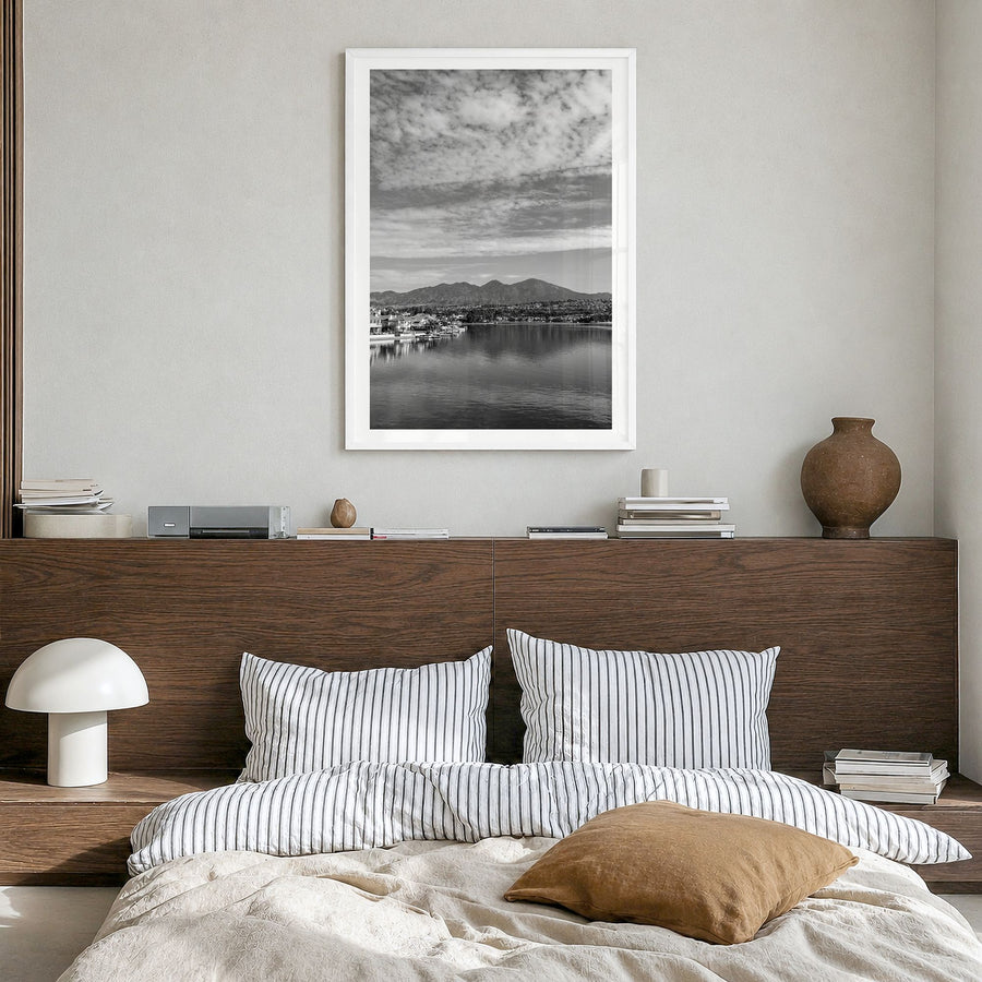 Mission Viejo Photo Poster in a white wood frame, hanging in a bedroom, white border
