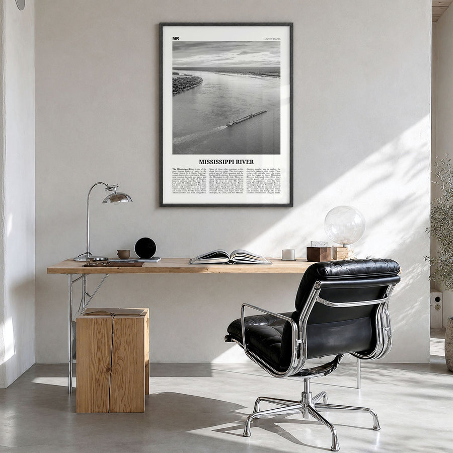 Mississippi River Newspaper Poster in a black wood frame, hanging in a bright home office