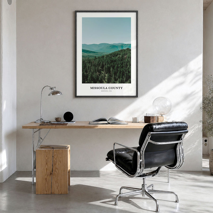 Missoula County Classic Poster in a black wood frame, hanging in a bright home office