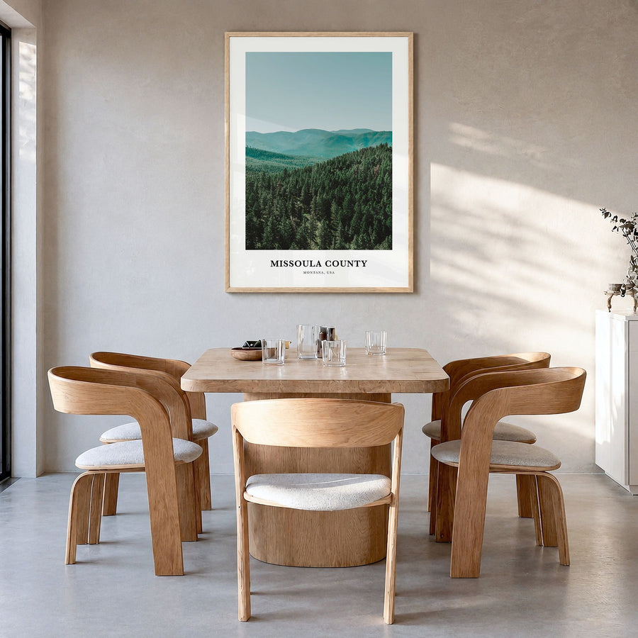 Missoula County Classic Poster in a natural wood frame, hanging in a dining room
