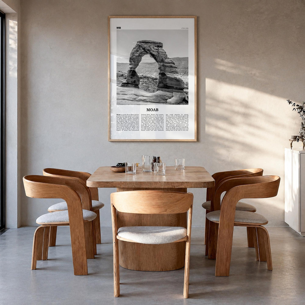 Moab black & white newspaper poster of Utah, USA – vertical wall art in natural wood frame, hanging on wall
