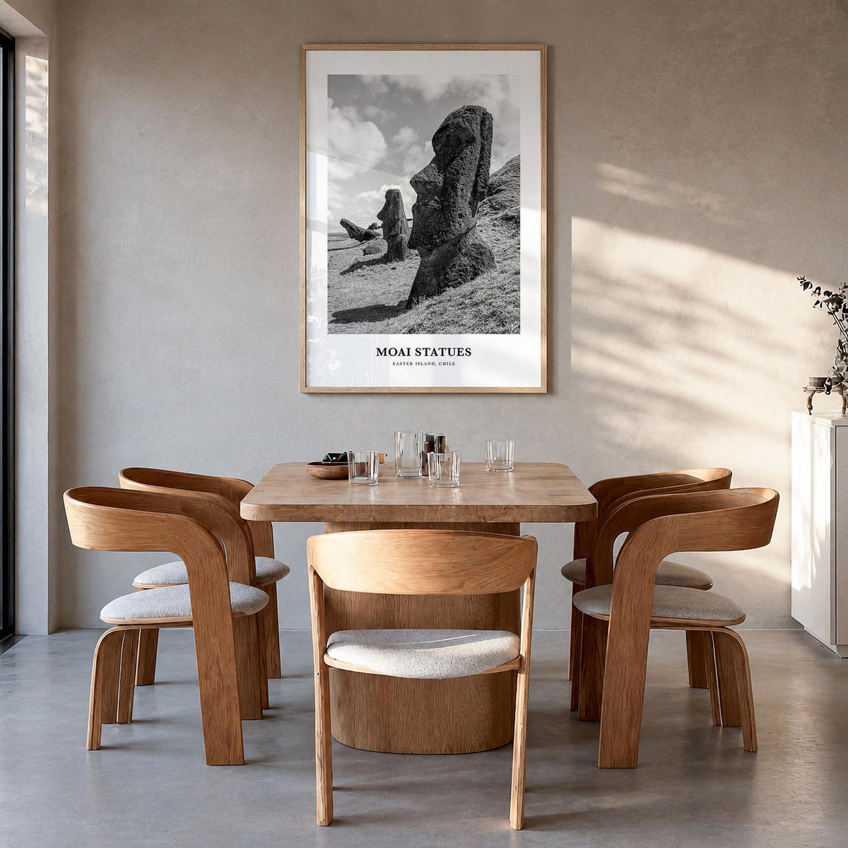 Moai Statues black & white classic poster of Chile – vertical wall art in natural wood frame, hanging on wall