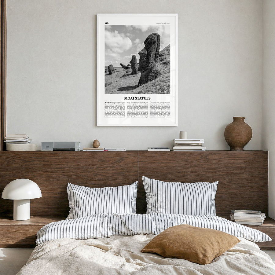 Moai Statues Newspaper Poster in a white wood frame, hanging in a bedroom
