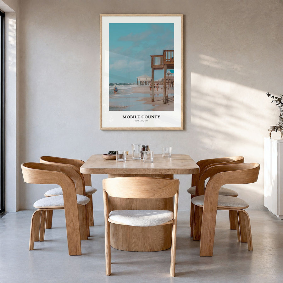 Mobile County Classic Poster in a natural wood frame, hanging in a dining room