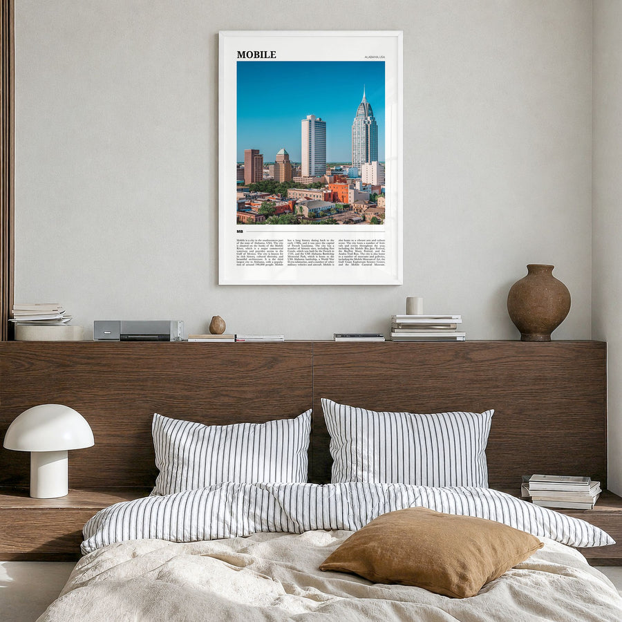 Mobile Travel Poster in a white wood frame, hanging in a bedroom