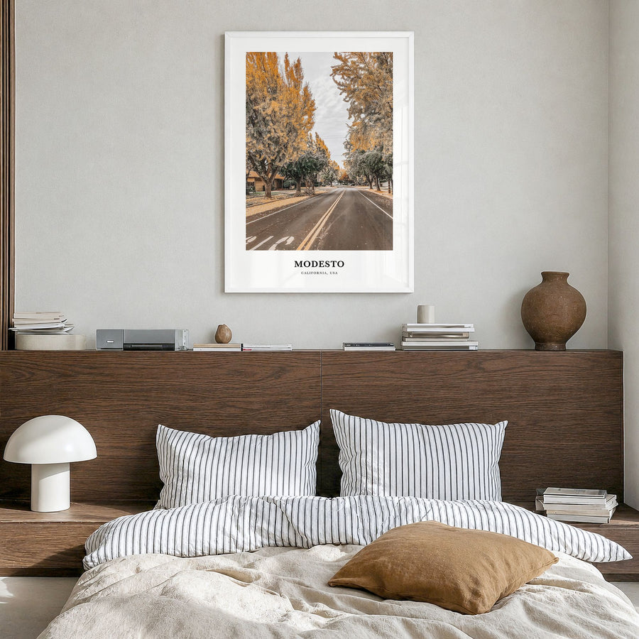 Modesto Classic Poster in a white wood frame, hanging in a bedroom