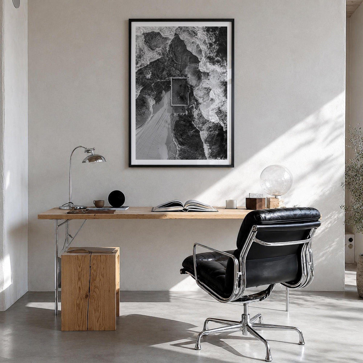 Mona Vale black & white photo poster of Australia – vertical wall art in black wood frame with white border, hanging on wall