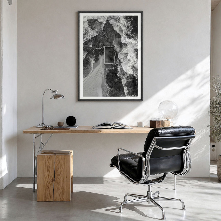 Mona Vale Photo Poster in a black wood frame, hanging in a bright home office, white border