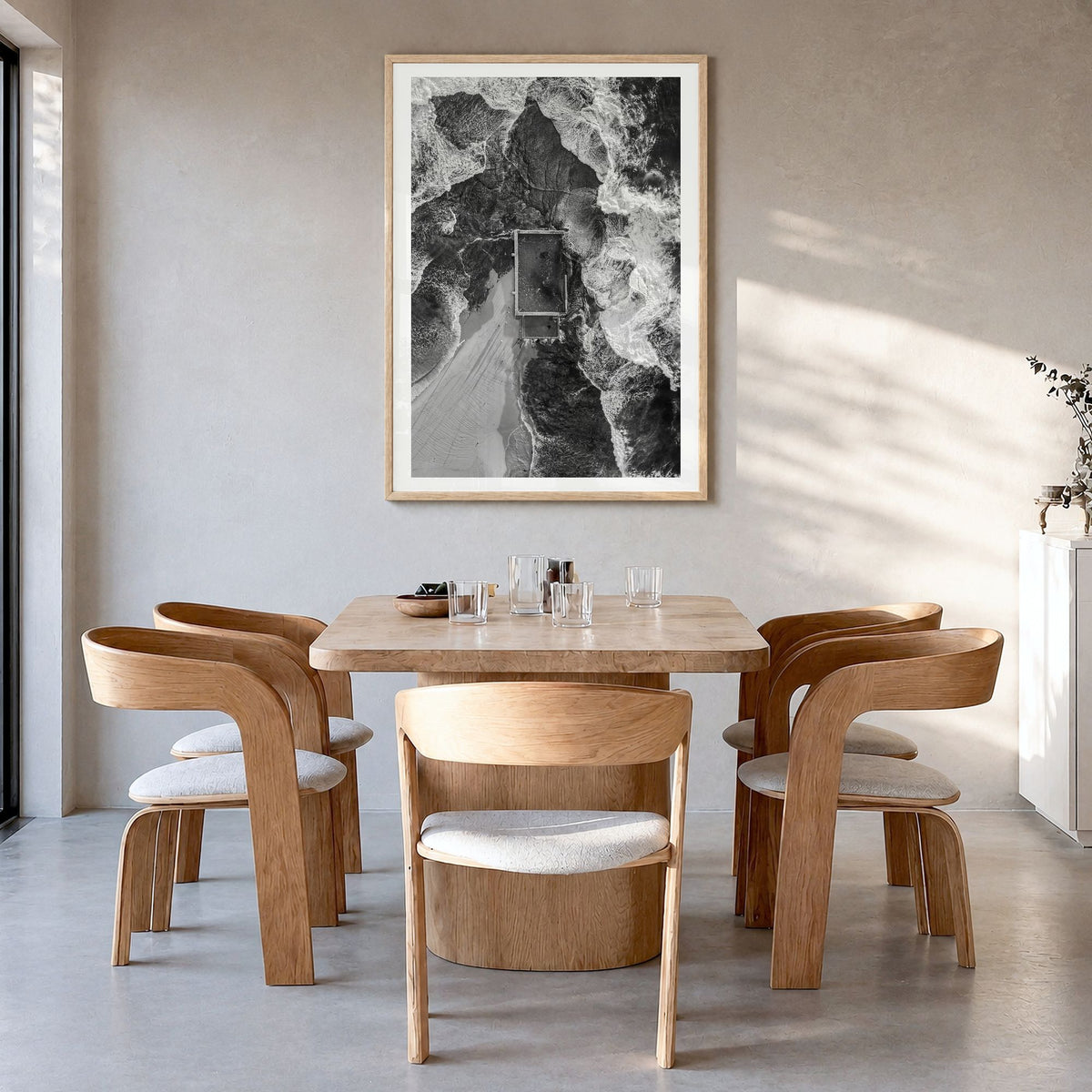 Mona Vale Photo Poster in a natural wood frame, hanging in a dining room, white border