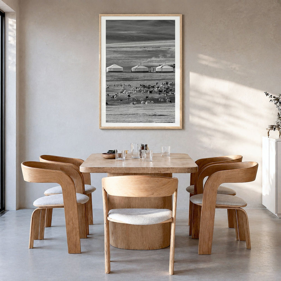 Mongolia Photo Poster in a natural wood frame, hanging in a dining room, white border