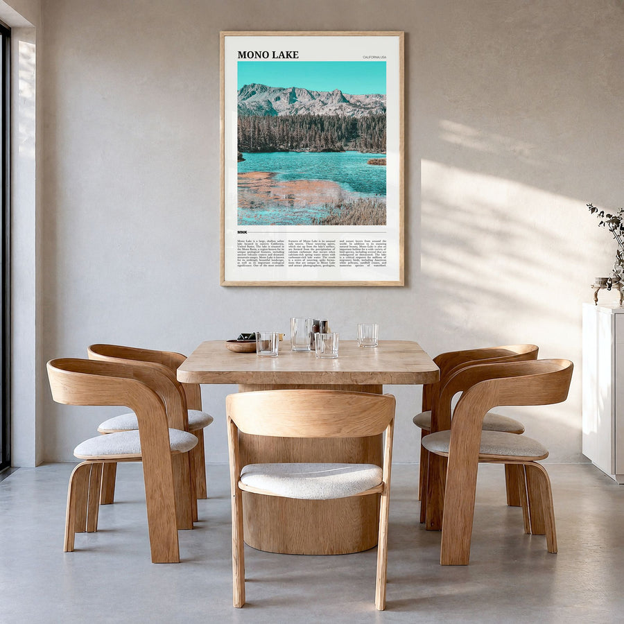 Mono Lake Travel Poster in a natural wood frame, hanging in a dining room