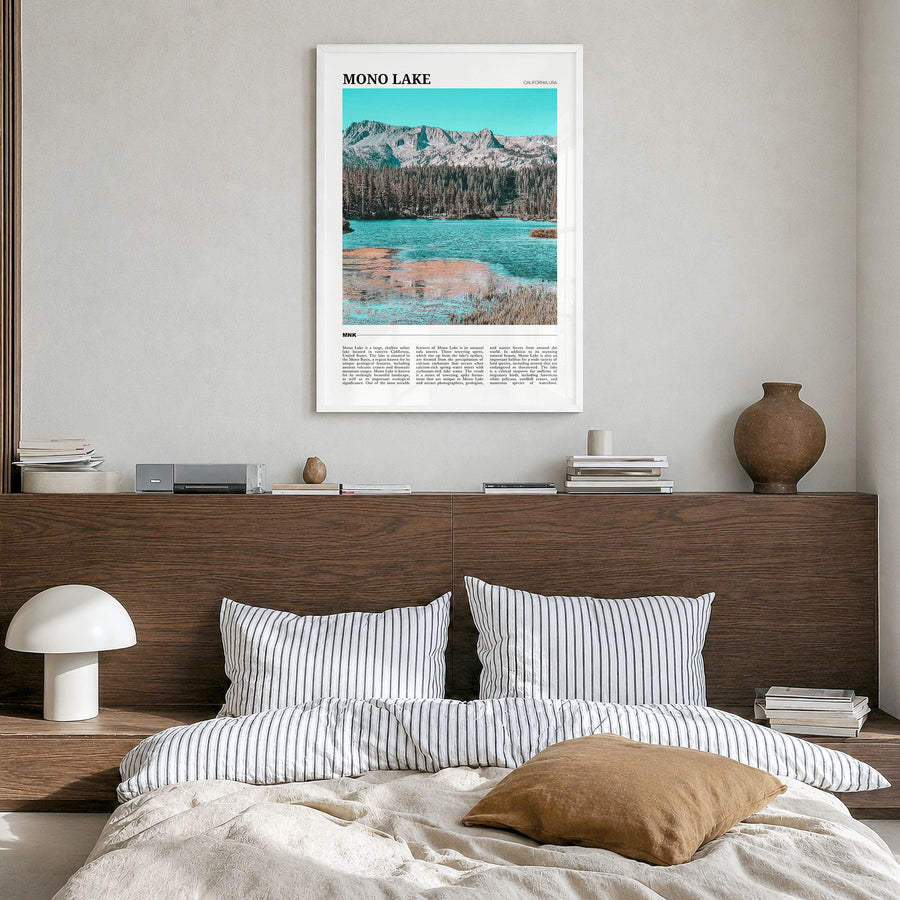 Mono Lake Travel Poster in a white wood frame, hanging in a bedroom