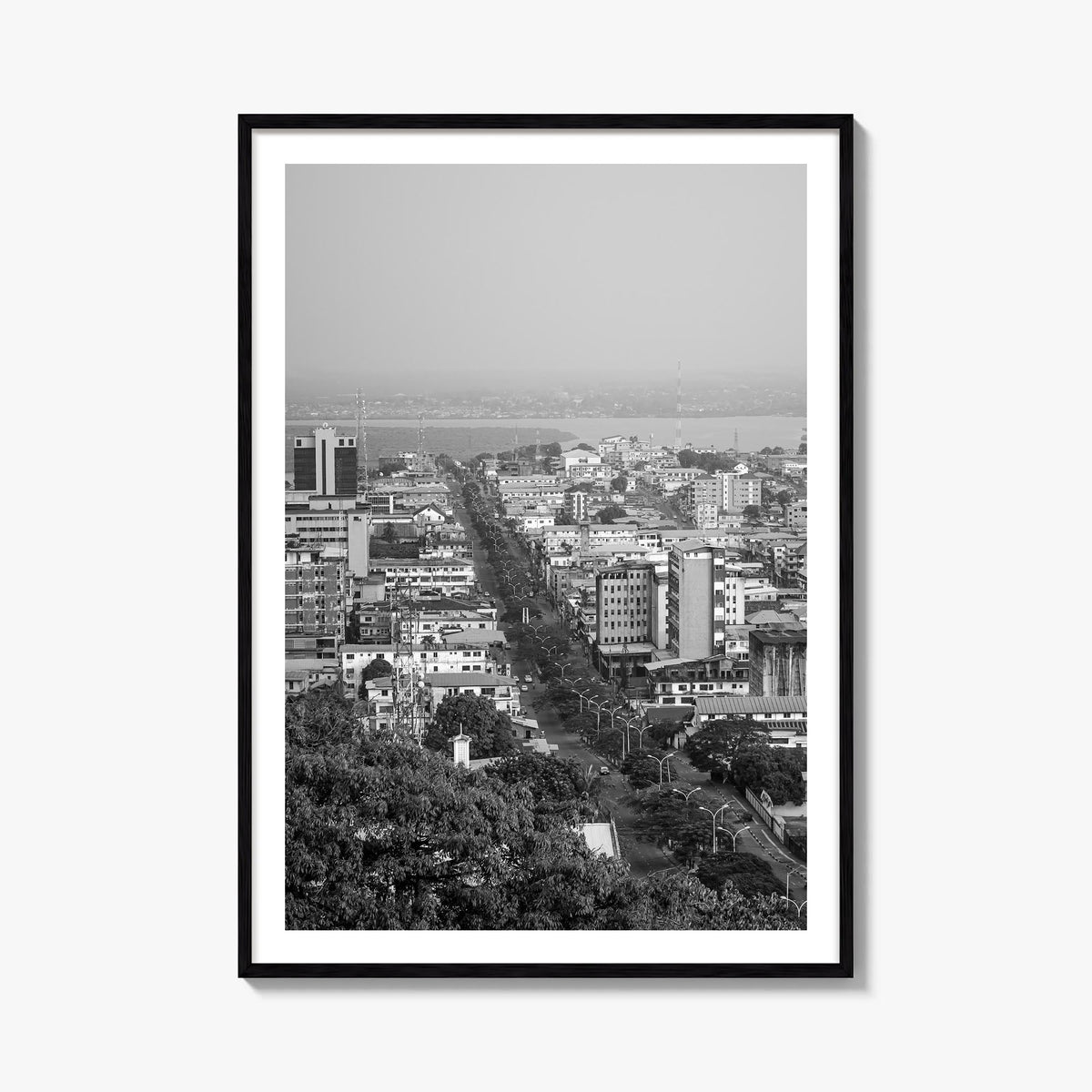 Monrovia black & white photo poster of Liberia – vertical wall art, unframed print shown in interior mockup