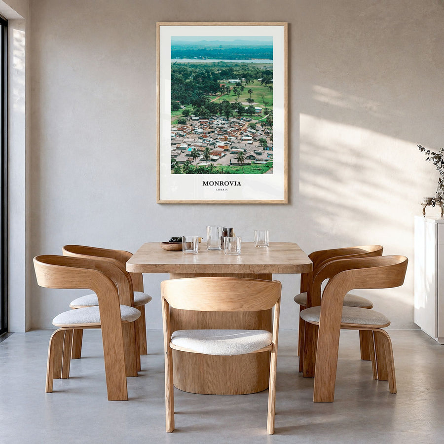 Monrovia Classic No 2 Poster in a natural wood frame, hanging in a dining room
