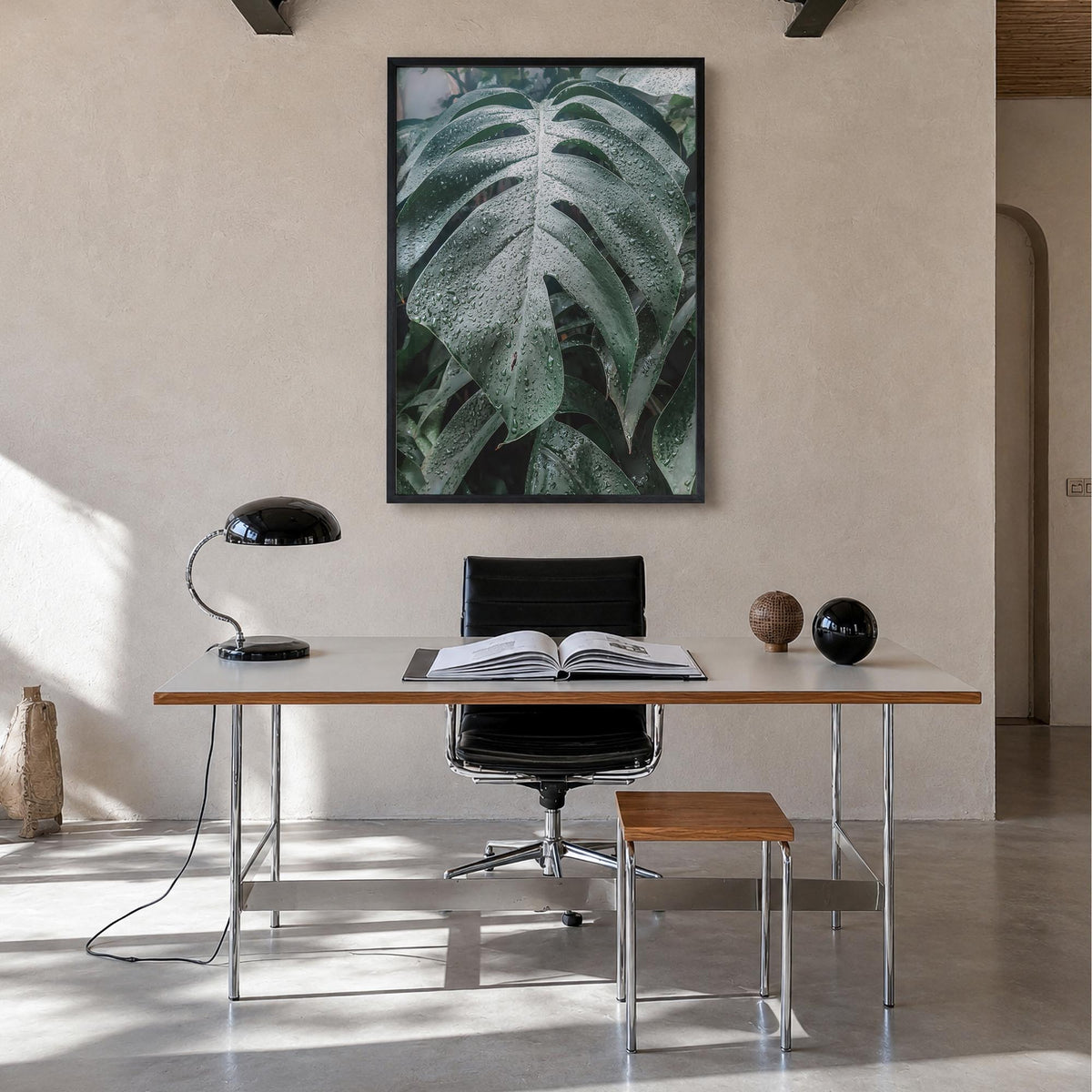 Monstera Leaf colorful photo poster – vertical wall art in black wood frame, hanging on wall