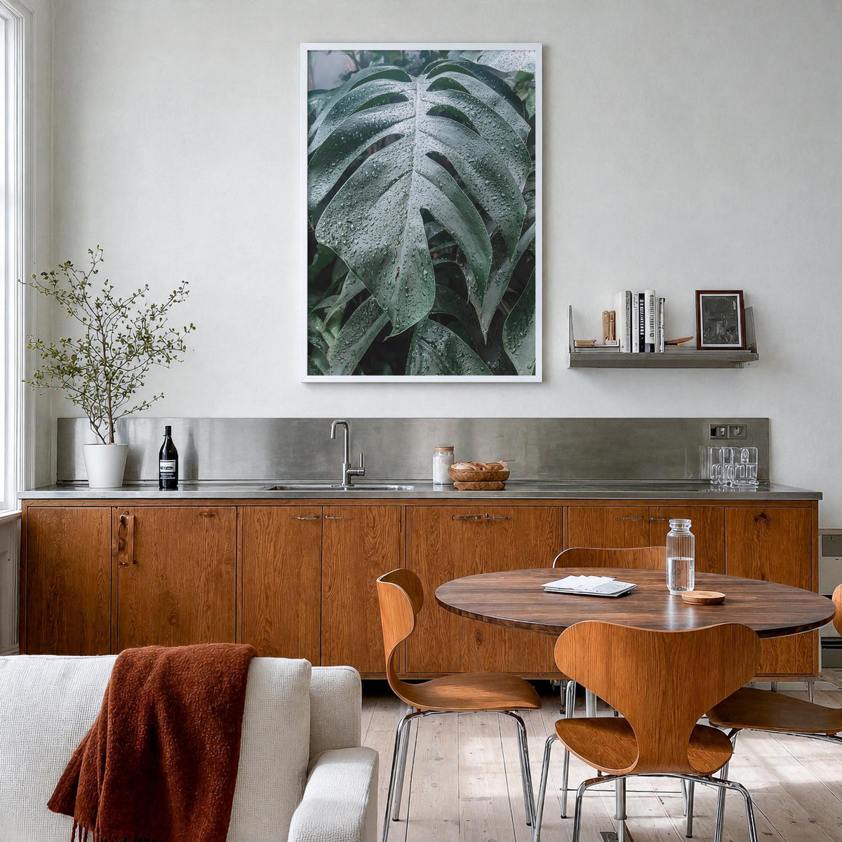Monstera Leaf colorful photo poster – vertical wall art in white wood frame, hanging on wall