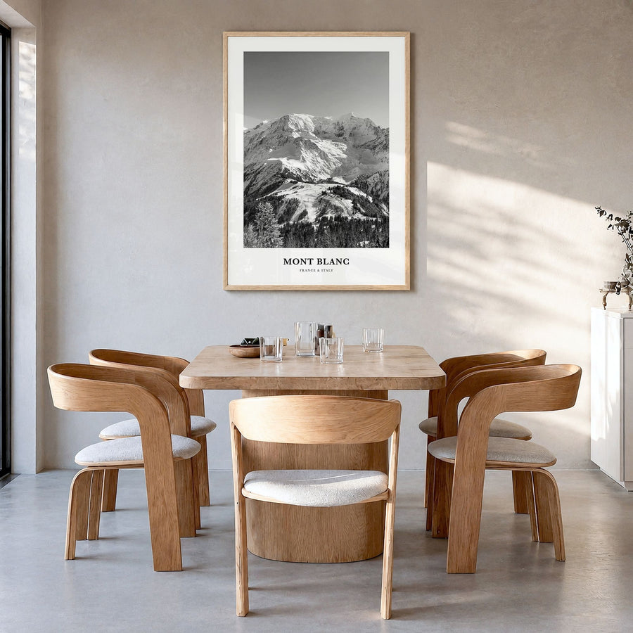 Mont Blanc Classic Poster in a natural wood frame, hanging in a dining room
