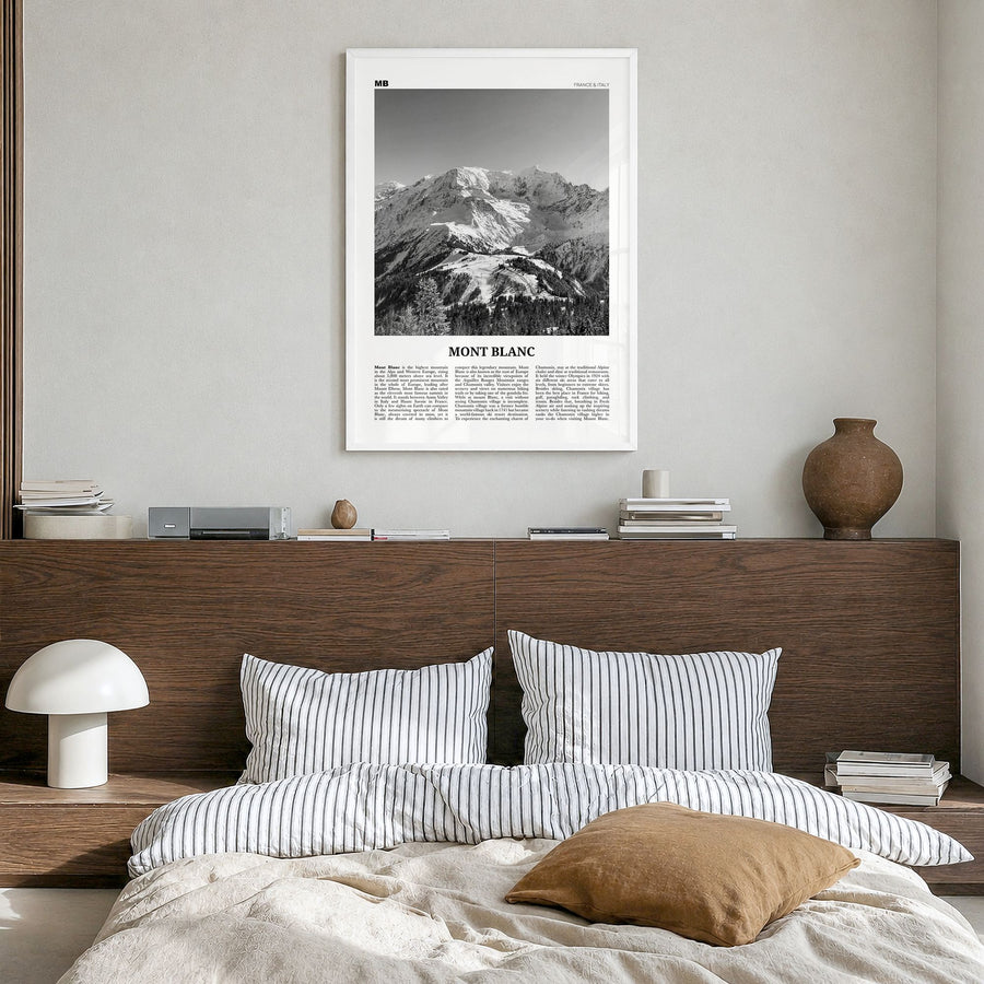 Mont Blanc Newspaper Poster in a white wood frame, hanging in a bedroom