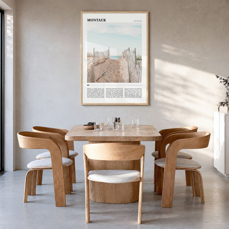 Montauk Travel Poster in a natural wood frame, hanging in a dining room