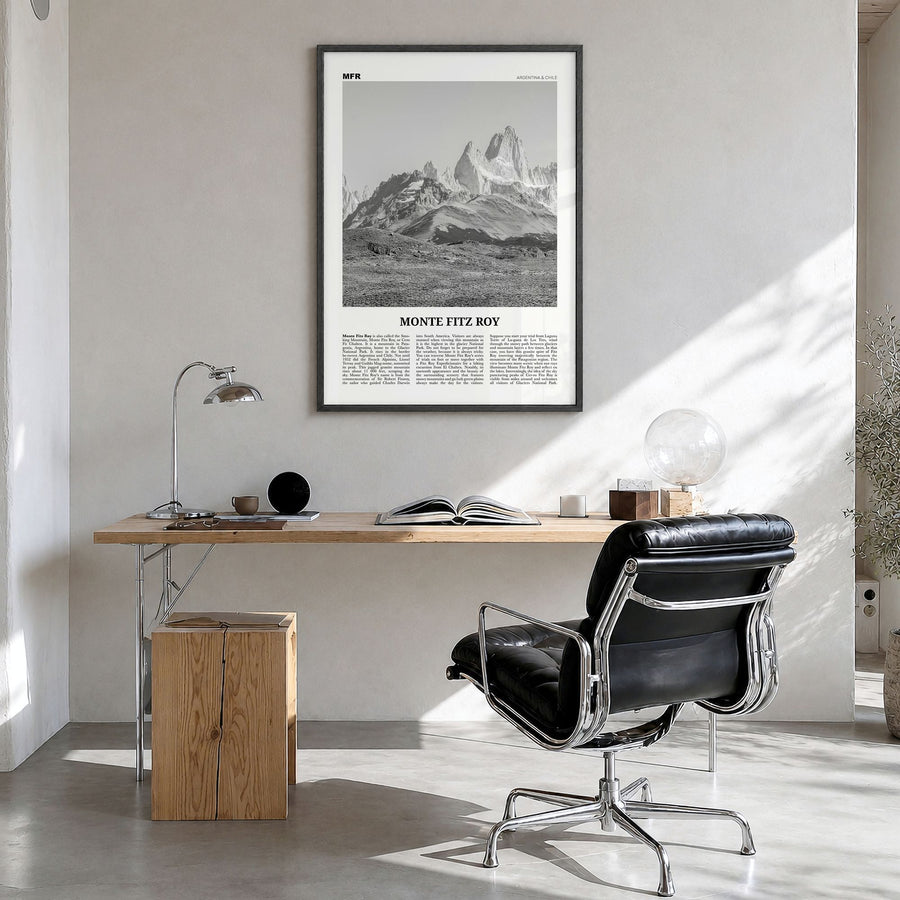Monte Fitz Roy Newspaper Poster in a black wood frame, hanging in a bright home office