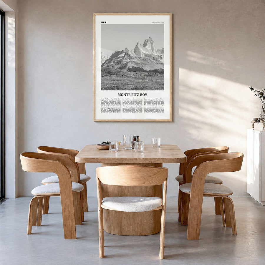 Monte Fitz Roy Newspaper Poster in a natural wood frame, hanging in a dining room