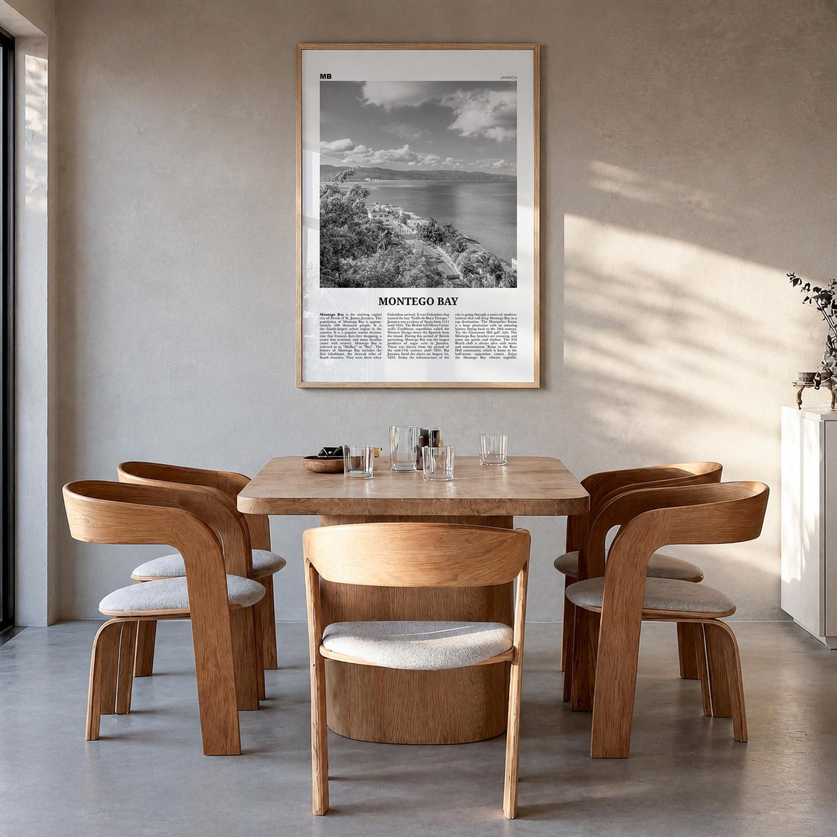Montego Bay black & white newspaper poster of Jamaica – vertical wall art in natural wood frame, hanging on wall