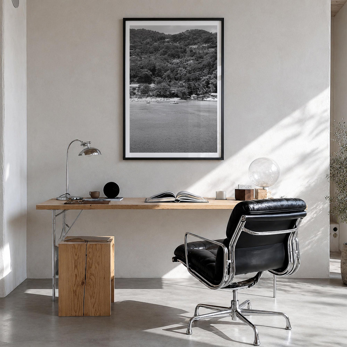 Montego Bay black & white photo poster of Jamaica – vertical wall art in black wood frame with white border, hanging on wall