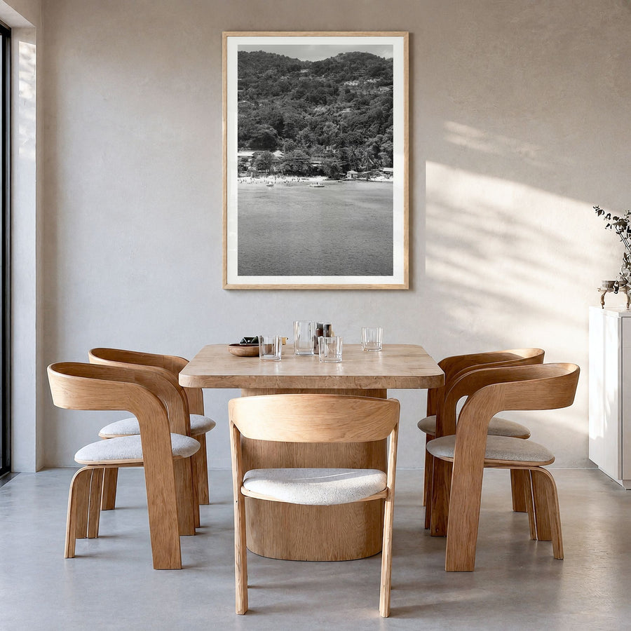 Montego Bay Photo Poster in a natural wood frame, hanging in a dining room, white border