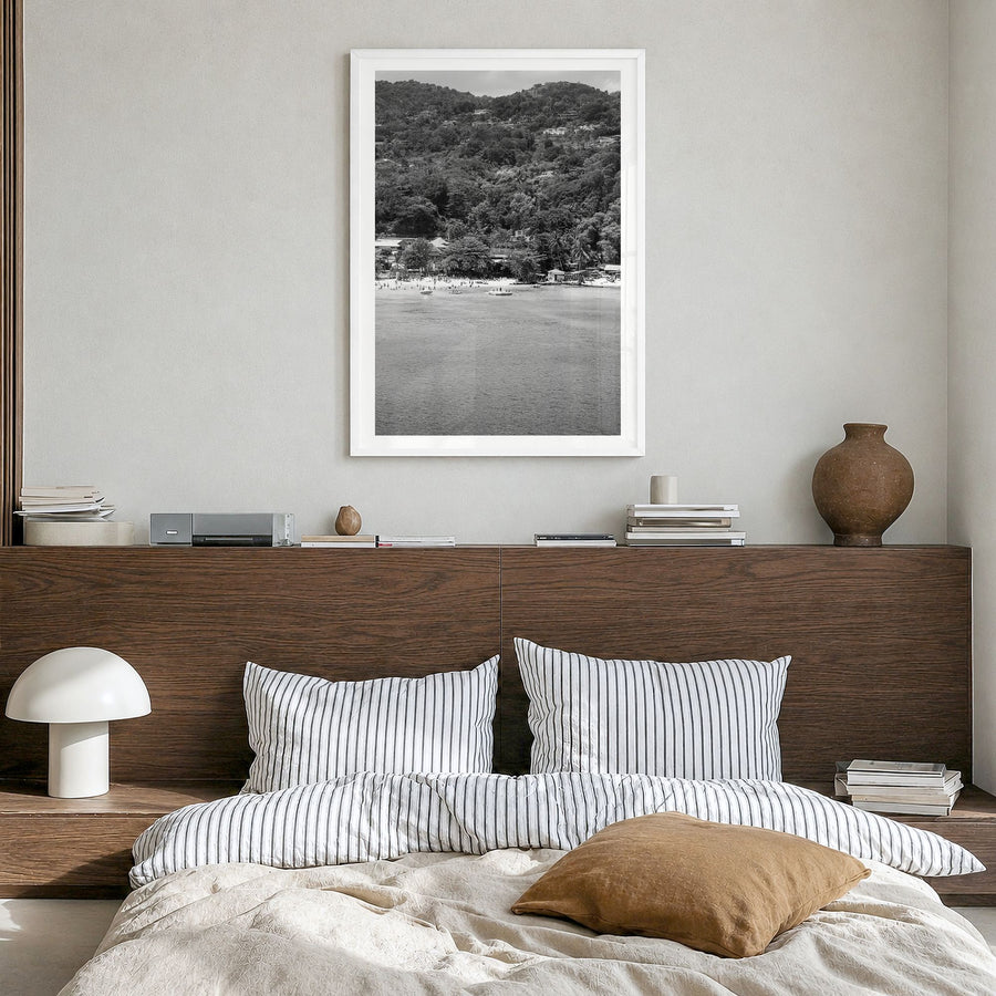 Montego Bay Photo Poster in a white wood frame, hanging in a bedroom, white border