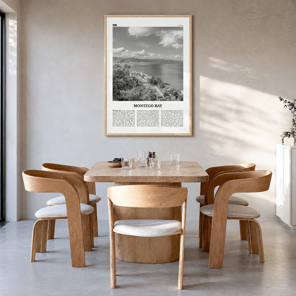 Montego Bay Newspaper Poster in a natural wood frame, hanging in a dining room