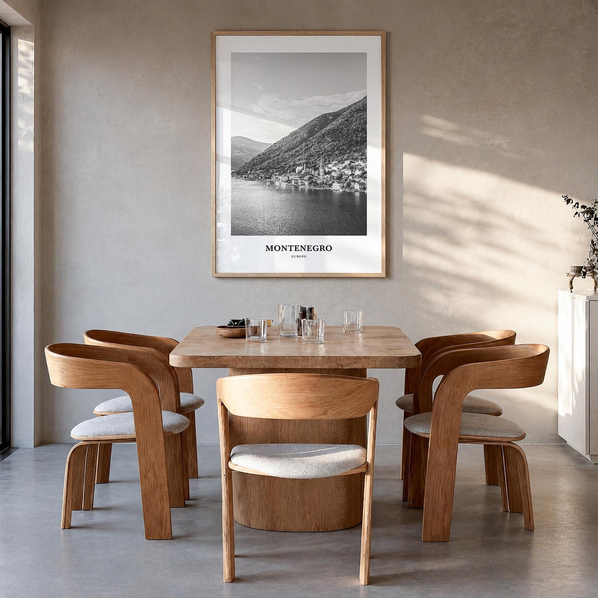 Montenegro black & white classic poster of Europe – vertical wall art in natural wood frame, hanging on wall