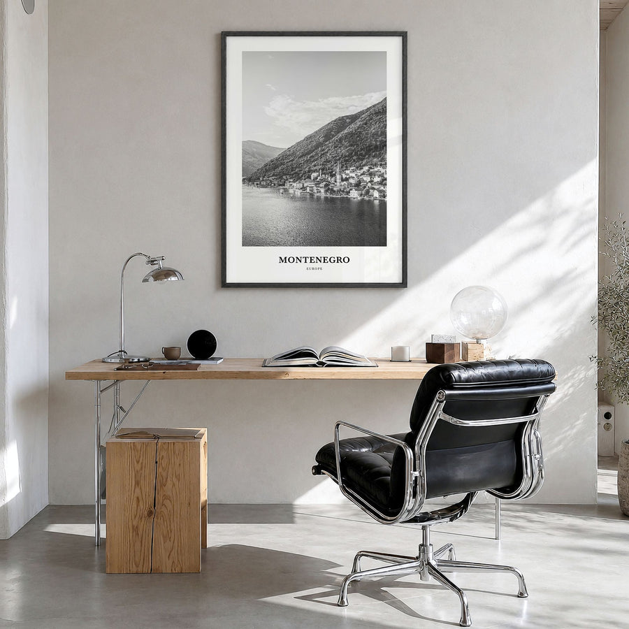 Montenegro Classic Poster in a black wood frame, hanging in a bright home office