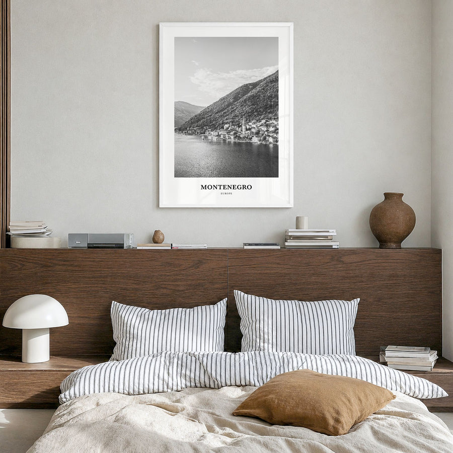 Montenegro Classic Poster in a white wood frame, hanging in a bedroom