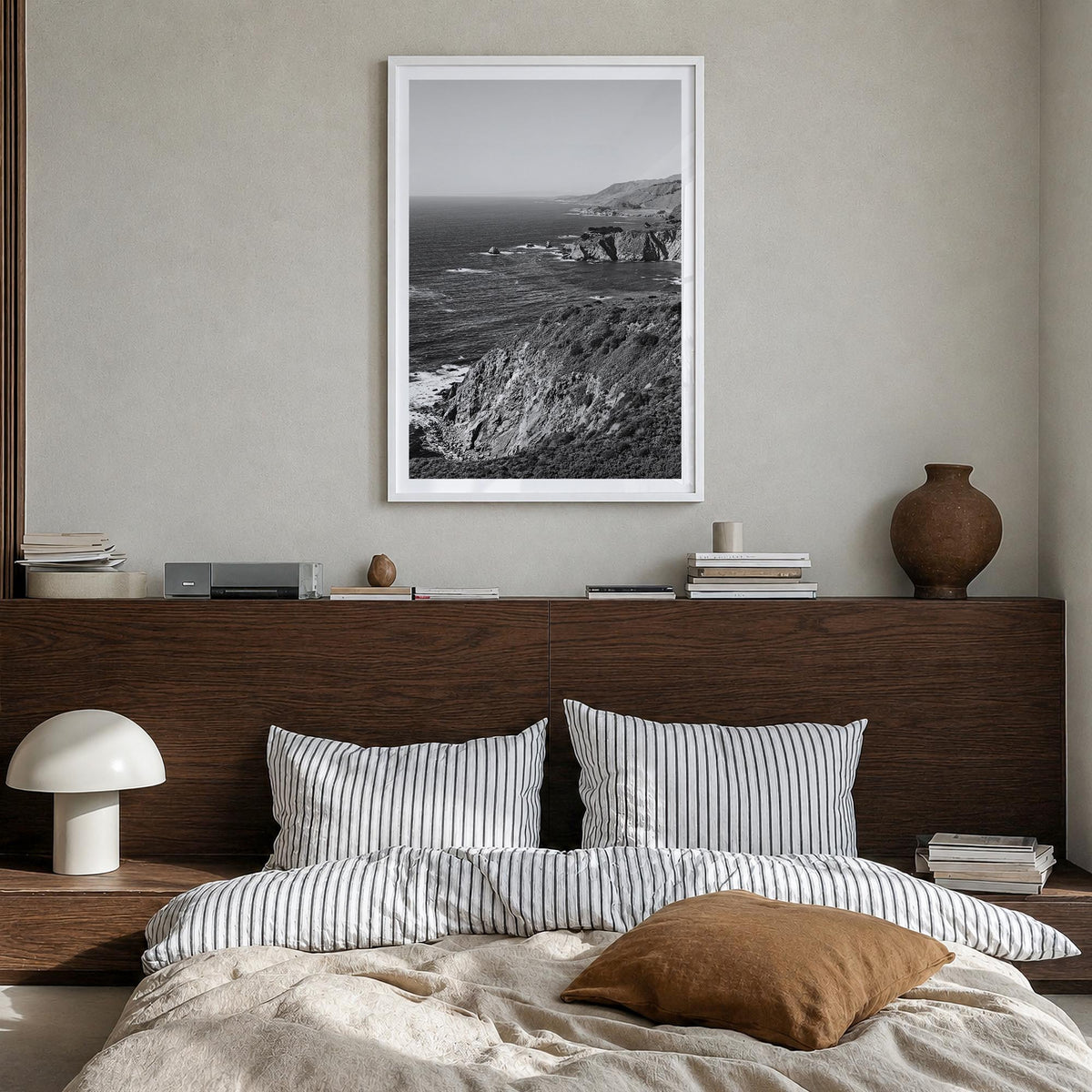 Monterey black & white photo poster of California, USA – vertical wall art in white wood frame with white border, hanging on 