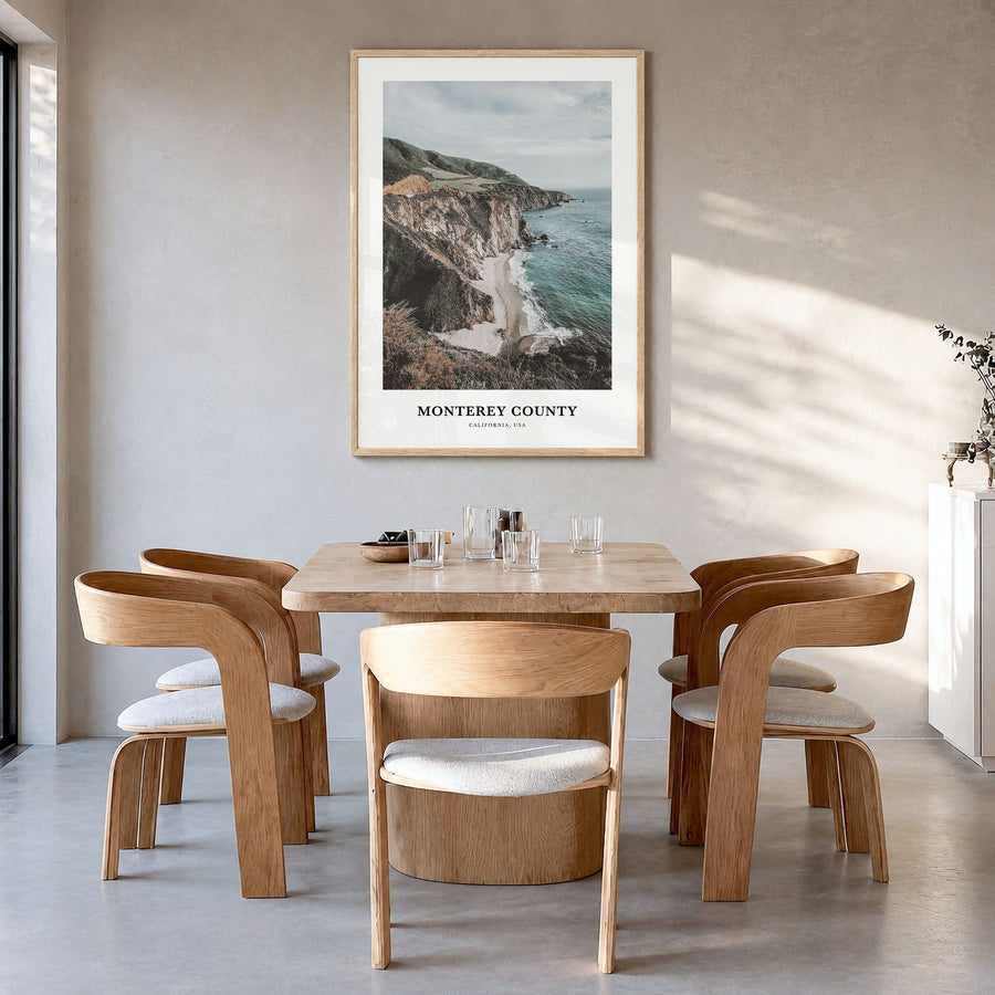 Monterey County Classic Poster in a natural wood frame, hanging in a dining room