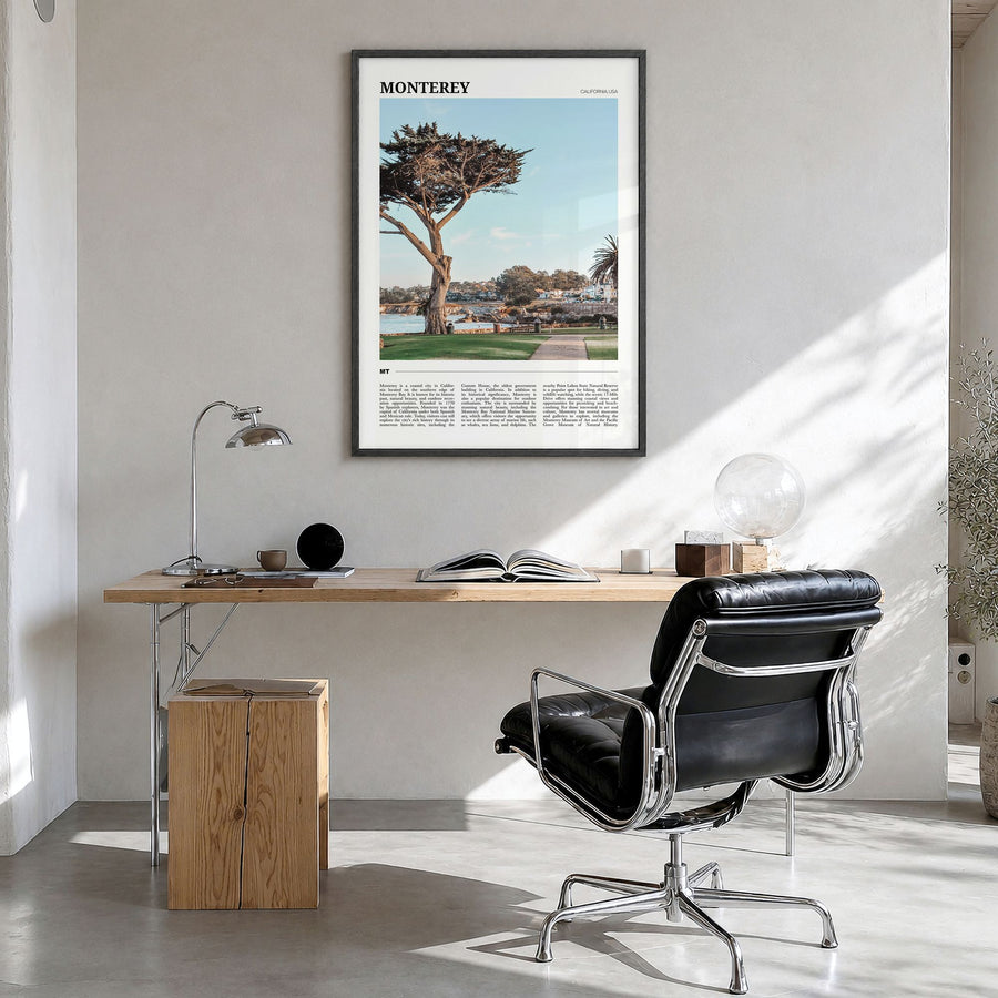 Monterey, California Travel Poster in a black wood frame, hanging in a bright home office