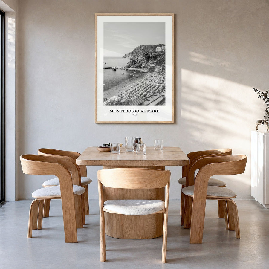 Monterosso al Mare Classic Poster in a natural wood frame, hanging in a dining room